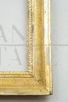 Antique Neapolitan Empire frame in carved and gilded wood
