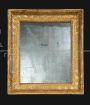 Antique Neapolitan Empire mirror in finely carved gilded wood