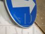 Vintage mandatory direction road sign, Italy 1990