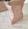 Vintage low coffee table with sculpted pink granite legs and glass top