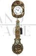 Antique pendulum wall clock in bronze from the 19th century