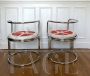 Pair of armchairs by Gae Aulenti in chromed steel