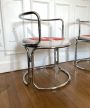 Pair of armchairs by Gae Aulenti in chromed steel