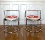 Pair of armchairs by Gae Aulenti in chromed steel                            