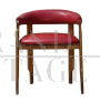 Curved chair from the 60s in burgundy skai and wood