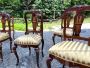 Set of 12 chairs + 2 head chairs in Palladian style inlaid with allegorical cherubs        