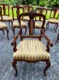 Set of 12 chairs + 2 head chairs in Palladian style inlaid with allegorical cherubs
