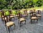 Set of 12 chairs + 2 head chairs in Palladian style inlaid with allegorical cherubs