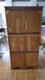 Vintage double roller shutter cabinet from the 1950s