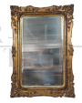 Gilded wooden mirror with floral decorations