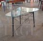 Vintage coffee table with magazine rack and shaped glass top