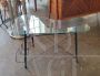 Vintage coffee table with magazine rack and shaped glass top