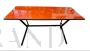 1960s iron table with orange glass top