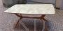 Ico Parisi style table in light wood with marbled glass top