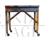 Industrial metal workshop table with wheels