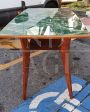 Mid-century Italian table from the 1950s with glass top