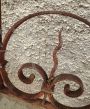 Antique bed headboard in hand-wrought iron, late 19th century