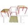 Trio of nest tables in red iron and smoked glass, 1980s