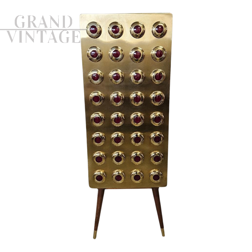 Armadietto stipo design in ottone con inserti circolari in vetro rosso                            