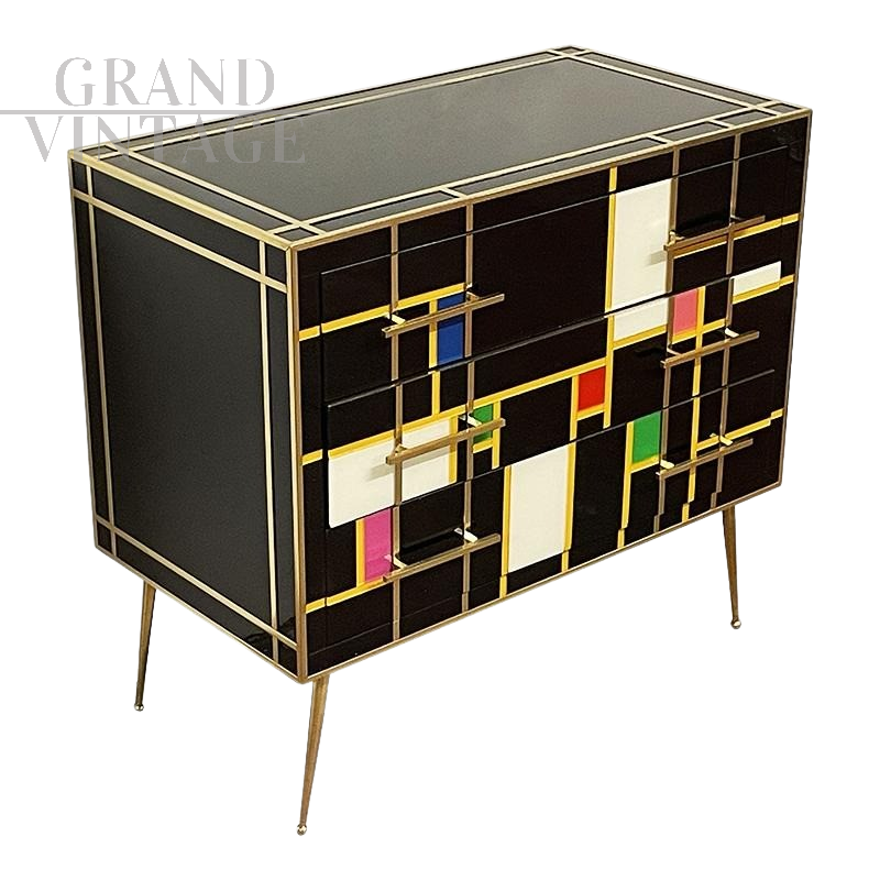 Comò a tre cassetti in vetro nero e colorato                            