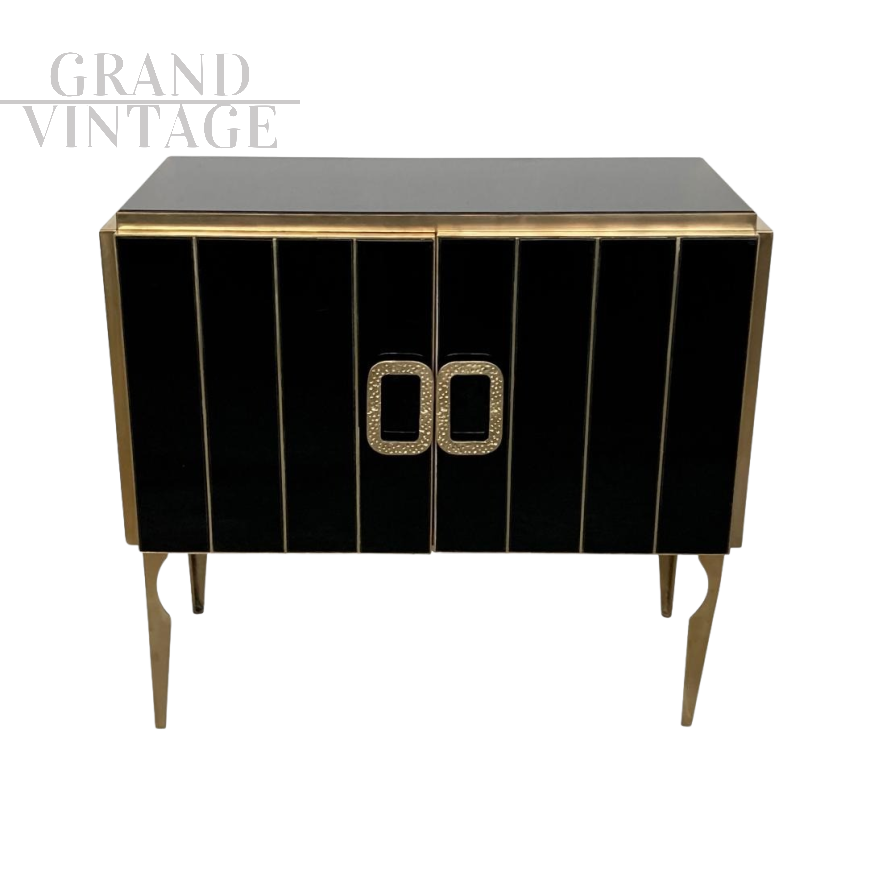 Credenza a due ante in vetro nero e ottone dorato                            