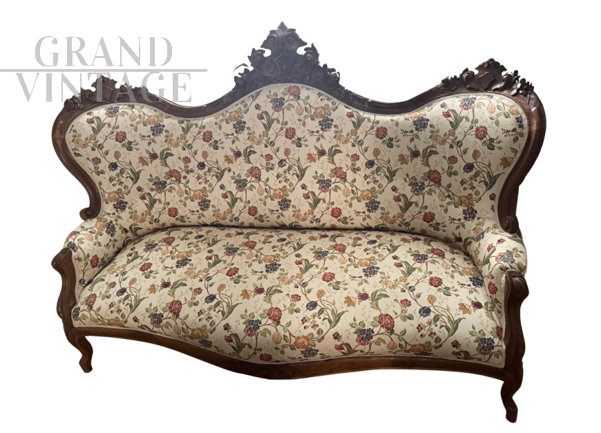 Divano antico intagliato in tessuto floreale                            