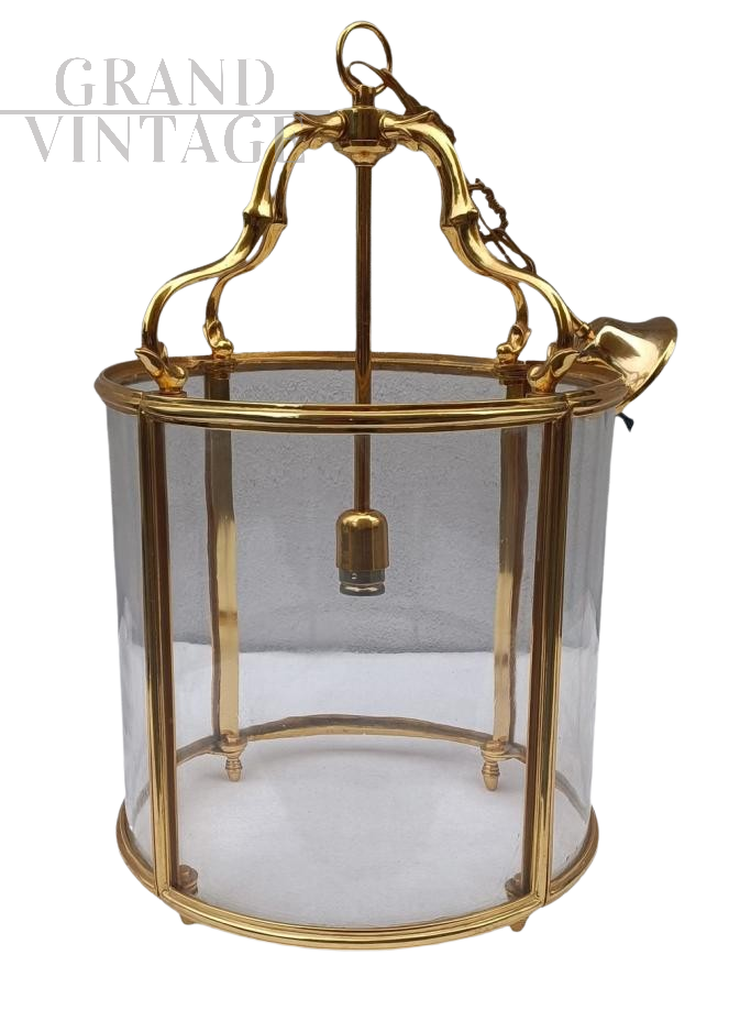 Lanterna rotonda in bronzo dorato e vetro                            