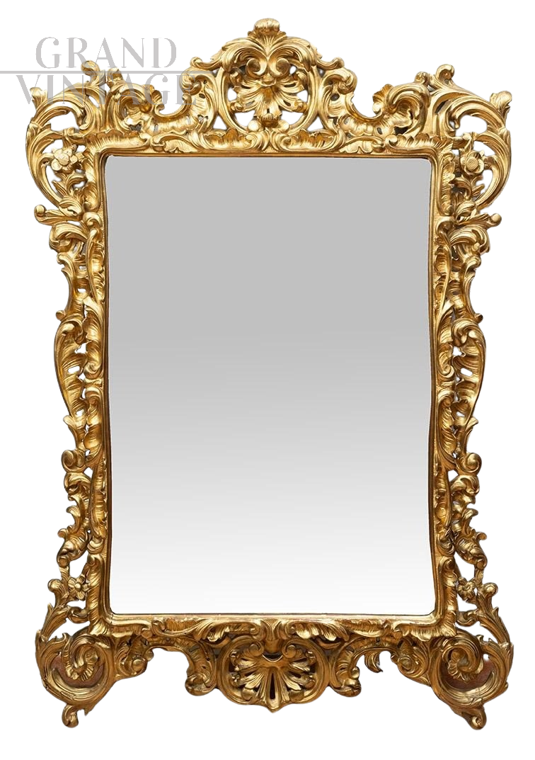 Specchiera antica stile Luigi XV in legno dorato e intagliato                            