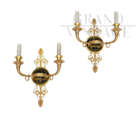 Coppia di applique antiche Impero in bronzo dorato e satinato                            