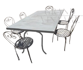 Set da giardino con 6 sedie e un grande tavolo in ferro battuto                           