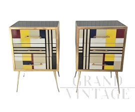 Coppia di comodini in vetro colorato con geometrie                            