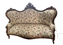 Divano antico intagliato in tessuto floreale                            