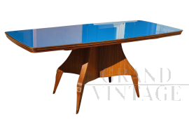 Tavolo anni '50 con piano in vetro azzurro e gamba centrale intarsiata                            