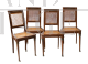 Gruppo di quattro sedie antiche in massello di mogano con innesti in bronzo                            
