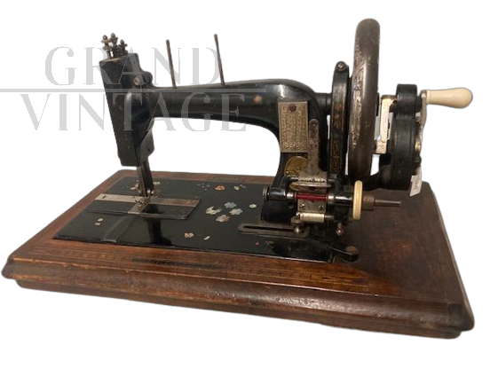 Antique Clemens Müller sewing machine from the late 19th century with mother of pearl                        
                            
