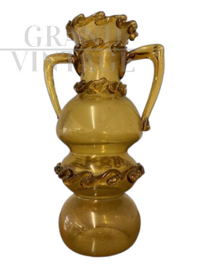 Antique amber-colored Murano glass vase from the late 1800s, decorated in relief