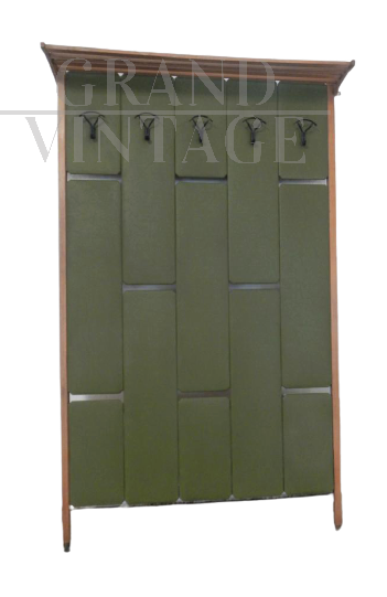 Vintage coat hanger in green leatherette