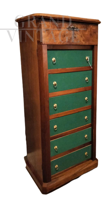 Vintage wooden filing cabinet with green cloth drawers