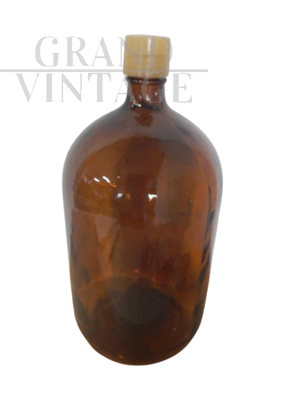 Vintage apothecary bottle with plastic cap                         
                            