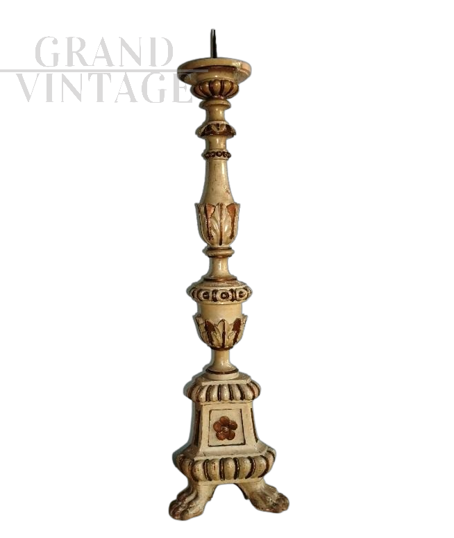 Antique carved, lacquered and gilded candlestick from the 19th century    