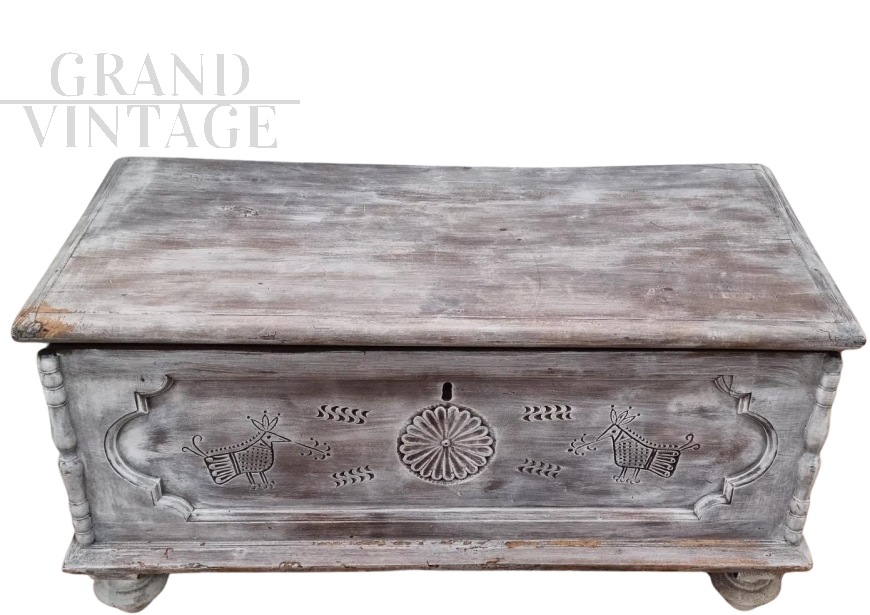 Antique Sardinian chest with typical carvings, from the early 1900s         