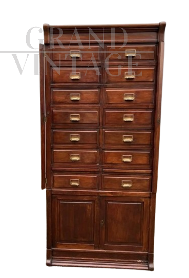 Vintage oak office filing cabinet with drawers and doors                            