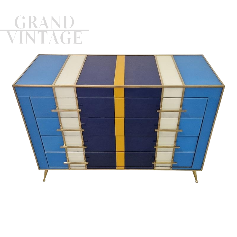 Dresser with 4 drawers covered in blue, white and yellow glass