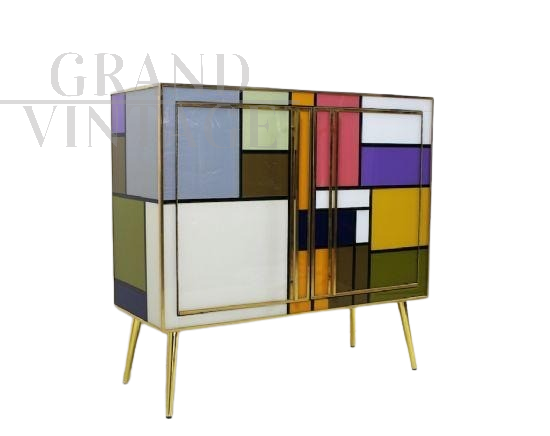 Vintage 1970s dresser covered in colored glass