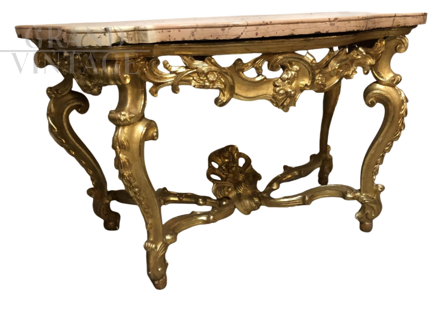 Roman Louis XV console in carved and gilded wood
