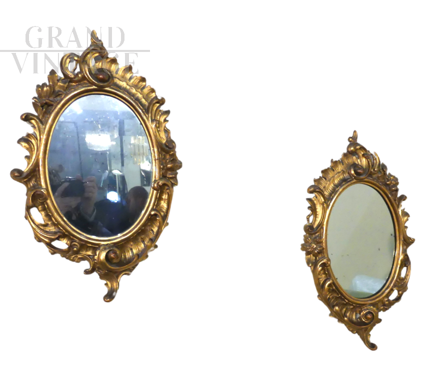 Pair of antique gilded mirrors                            