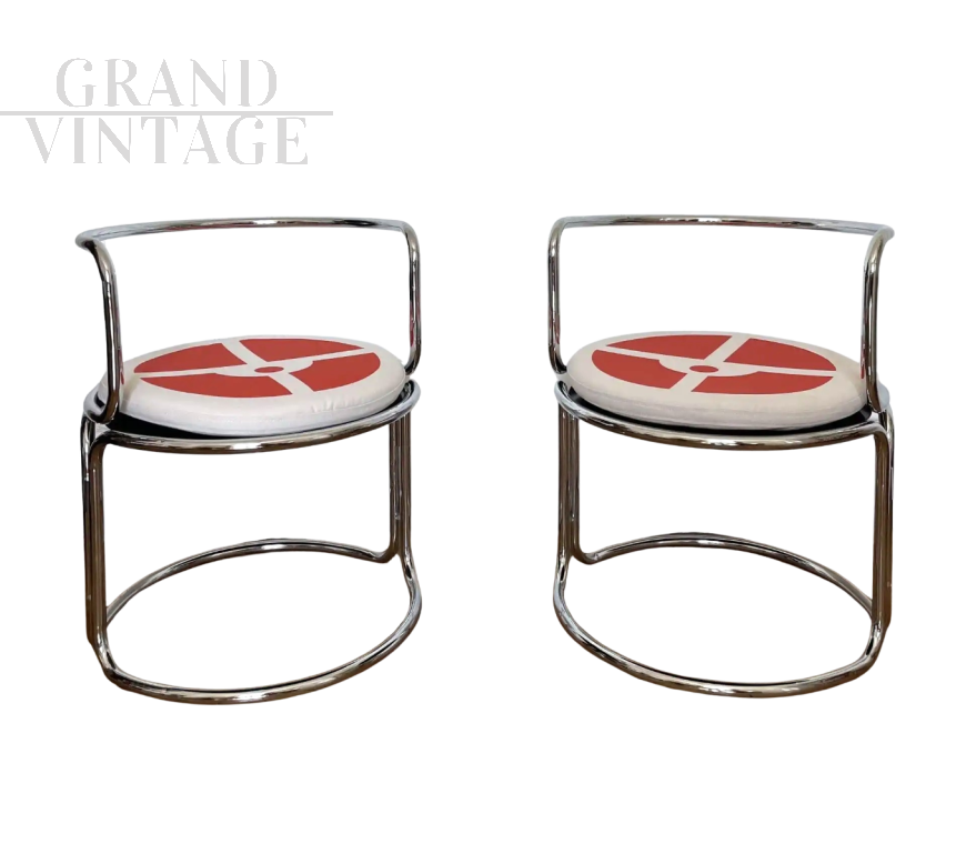 Pair of armchairs by Gae Aulenti in chromed steel