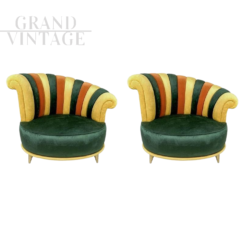 Pair of multicolored round design armchairs with asymmetrical backrest