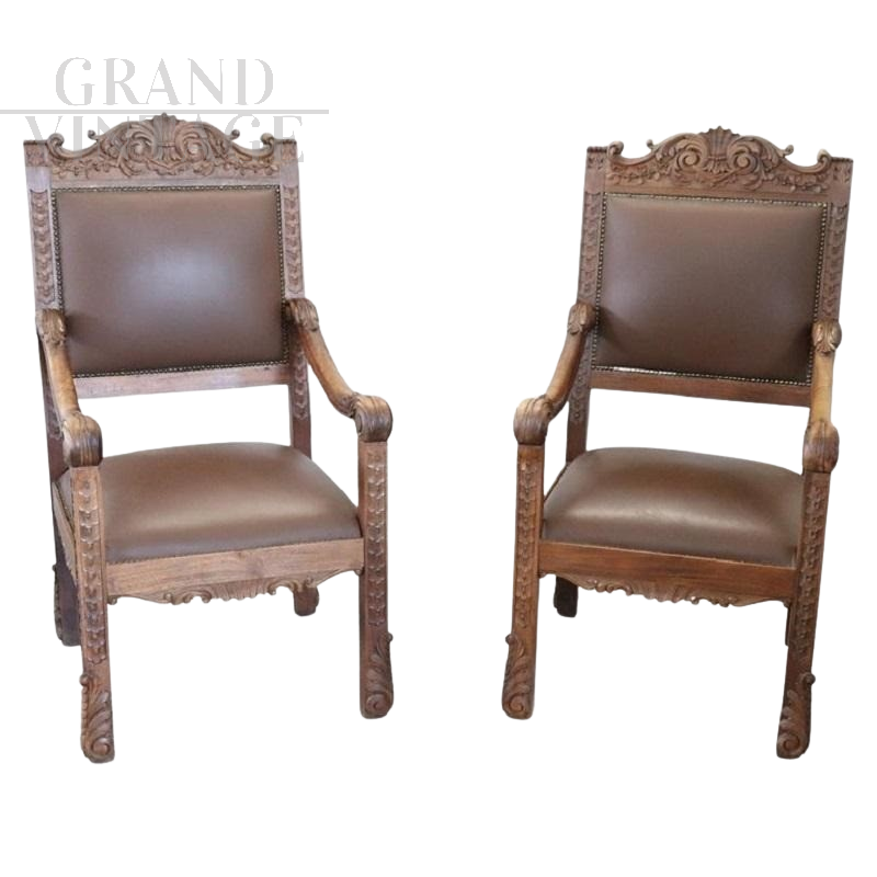 Pair of Renaissance style armchairs in carved walnut, late 19th century
