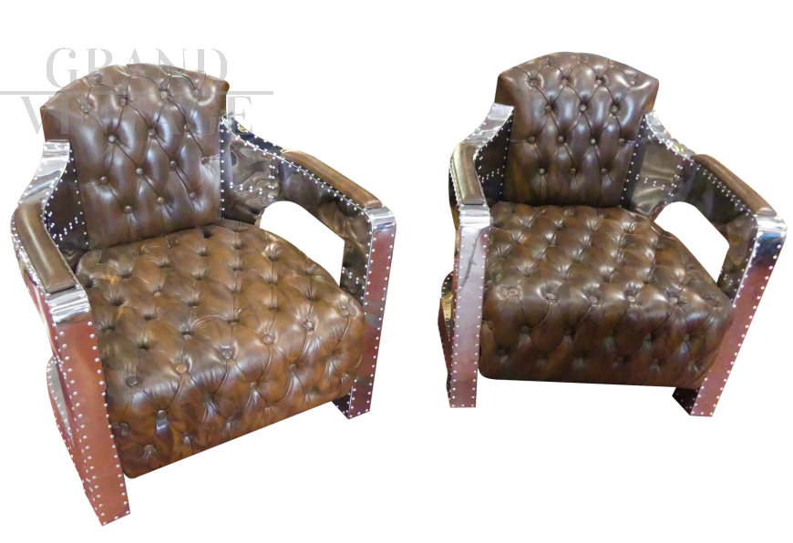 Pair of aviator model armchairs in leather and steel